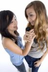 Girls Holding Microphone Stock Photo