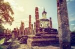 Vintage Buddha Statue Among The Ruins Stock Photo