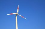 White Windmill With Red Bar Stock Photo