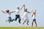 happy family Jumping Stock Photo