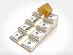 Money Stacks And Gold House Symbol Stock Photo