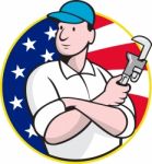 American Plumber Worker With Adjustable Wrench Stock Photo