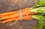 Baby Carrots Bunch Tied With Rope Stock Photo