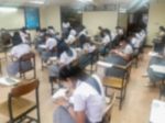 Blur Background University Students Writing Answer Doing Exam In Stock Photo