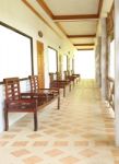 Balcony Way Of Long House With Wooden Chair Stock Photo