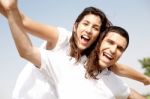 Young Man Piggyback His Girlfriend Stock Photo