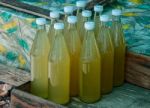 The Bottle Of Water Raw Palm Sugar In Thailand Stock Photo