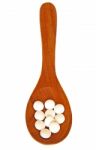 Wooden Spoon With Pills Stock Photo