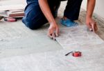 Floor Tile Installer Stock Photo