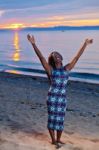 Beautiful Black African American Woman Posing On The Beach At Su Stock Photo