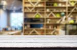 Selected Focus Empty Brown Wooden Table And Coffee Shop Or Resta Stock Photo