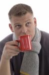 Young Man Drinking Coffee Stock Photo