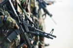 Soldier Carrying Gun Stock Photo