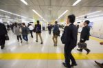 People Hurry At Shinjuku Station, Tokyo Stock Photo