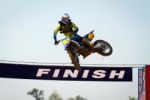 Motocross Winner Jump Stock Photo