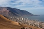 Iquique Behind A Huge Dune, Northern Chile Stock Photo