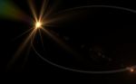 Digital Lens Flare In Black Background.beautiful Rays Of Light Stock Photo