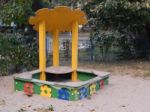 Children Playground, Swing Near The House  Stock Photo