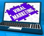 Viral Marketing On Laptop Shows Social Media Advertisement Stock Photo