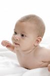 Smiling Baby Lying Stock Photo