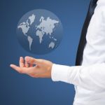 Businessman Holding World Stock Photo