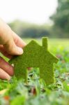 And Holding Eco House Icon Stock Photo