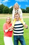 Smiling Family In Outdoors Stock Photo