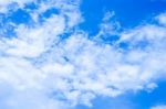 Blue Sky Background With White Clouds Stock Photo