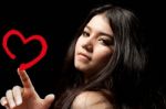 Lady Touching Heart Symbol Stock Photo