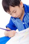 Adorable Boy Drawing Picture Stock Photo