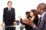 Multi Ethnic Team During Meeting Stock Photo