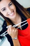 Young Woman Shopping For Clothes Stock Photo