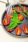 Baked Cherry Tomatoes With Basil And Thyme Stock Photo