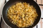 Onion Frying In A Pan Stock Photo