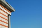 Brick Building With Sky Bakground Stock Photo