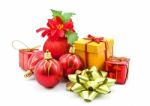 Gift Box And Christmas Baubles Stock Photo