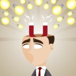 Cartoon Businessman With Magnetic Idea Bulb Stock Photo