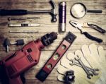 Set Of Tools Over A Wood Background Stock Photo