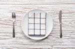 Empty Plate Napkin Fork Knife Silverware White Wooden Table Background Stock Photo