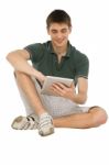 Teenage Boy Using Ipad Stock Photo