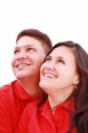 Young Loving Couple Looking Up Stock Photo