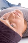 Young Man Lying On Floor Stock Photo