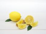 Fresh Lemon Slice On White Wood Background Stock Photo