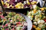 An Assortment Of Salads On A Buffet Table Stock Photo