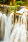 Tropical Waterfall In Kanchanaburi, Thailand Stock Photo