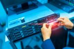 Man Fix Server Network In Data Center Room Stock Photo