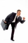 Businessman Running With Briefcase Stock Photo