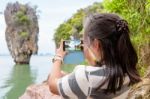 Women Tourist Shooting Natural View By Mobile Phone Stock Photo