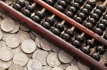 Abacus On Money Stock Photo