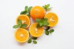 Fresh Orange Citrus Fruit On White Background. Top View Stock Photo